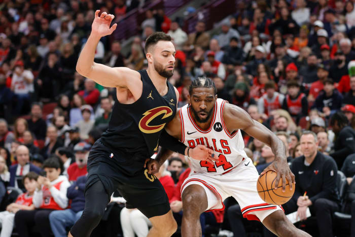 Dec 23, 2023; Chicago, Illinois, USA; Chicago Bulls forward Patrick Williams (44) drives to the basket against Cleveland Cavaliers guard Max Strus (1) during the first half at United Center. Mandatory Credit: Kamil Krzaczynski-USA TODAY Sports